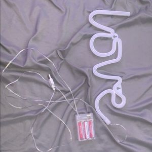 Hot pink “love” LED sign